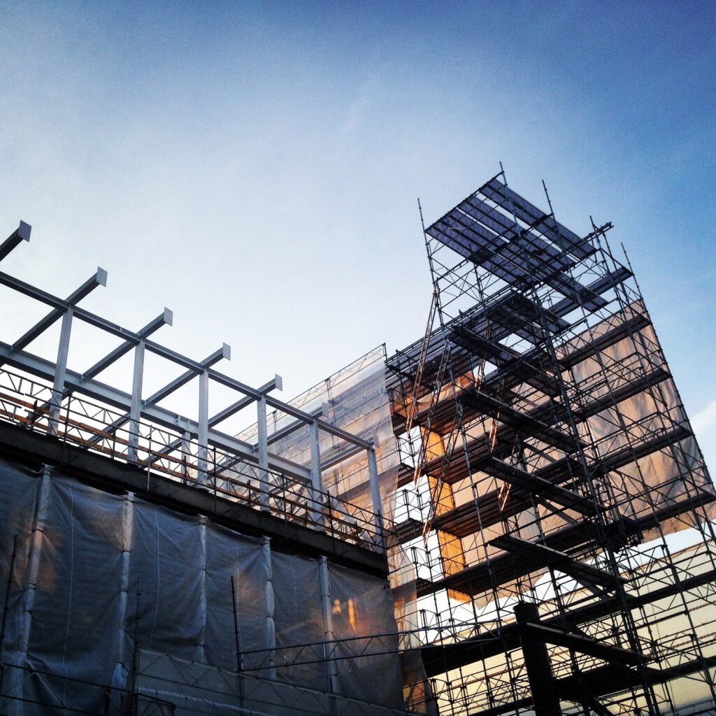 the worker moves on the scaffolding